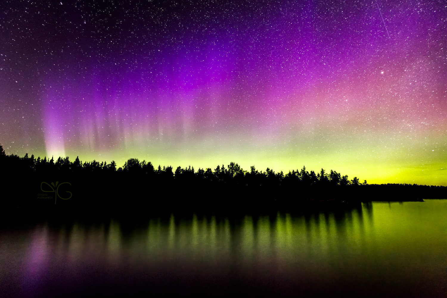 Aurora Borealis glow over Lehtisinsaari island in Ladoga lake